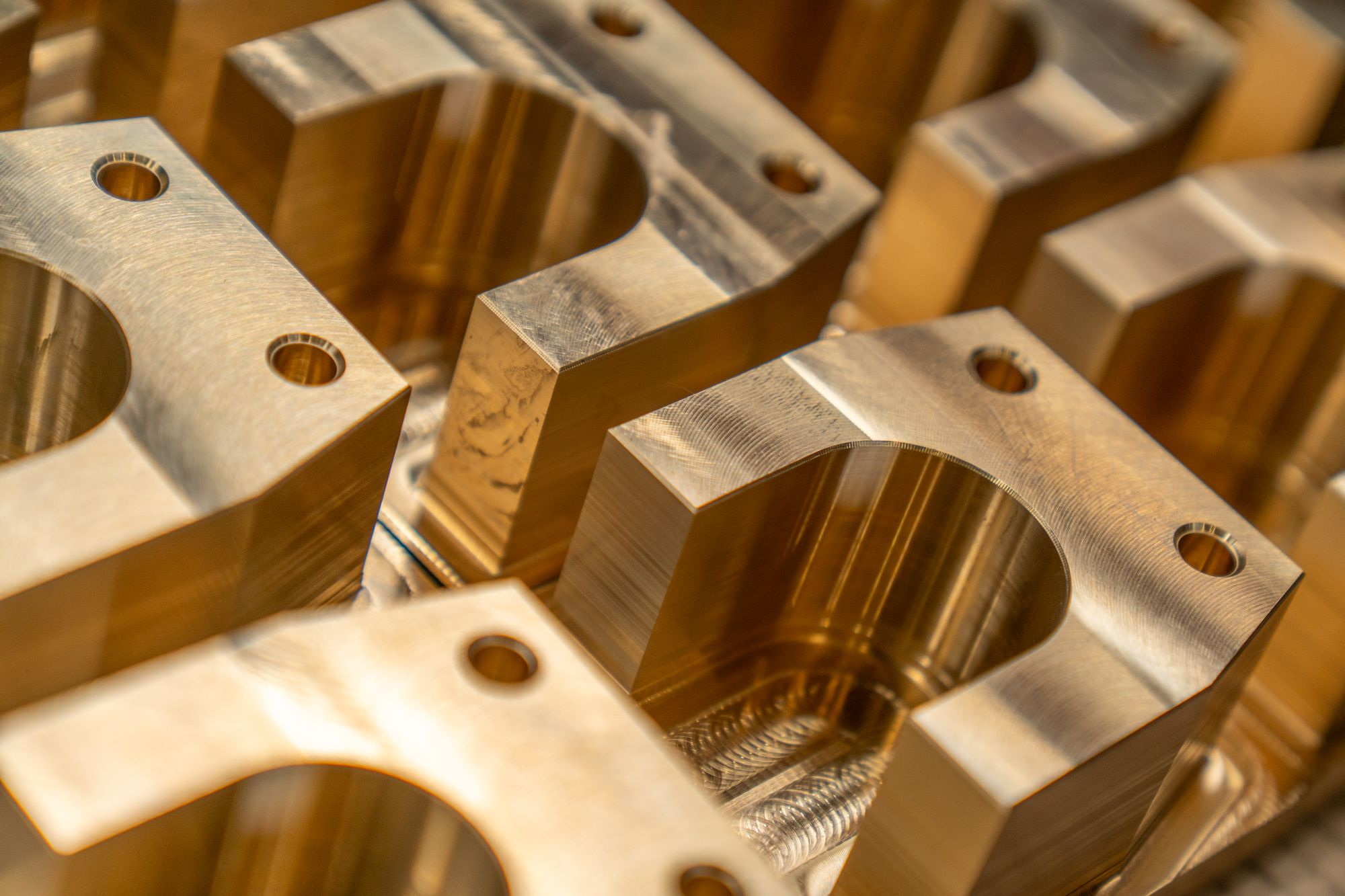 Machined bearing housings and saddle blocks